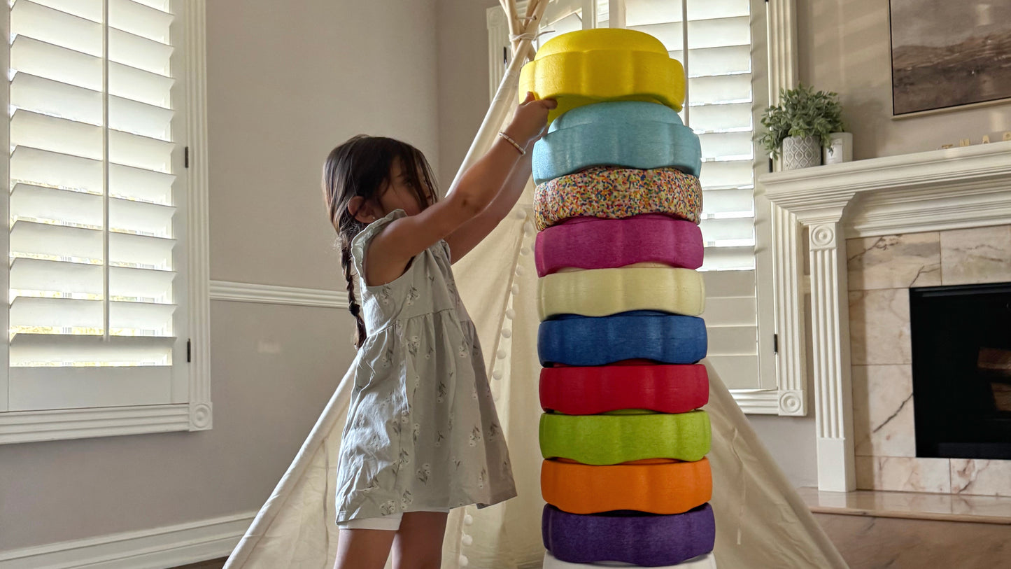 Colorful fun versatile stacking stones, stepping stones made out of lightweight Expended Polypropylene foam for kids for movement, open ended play, active learning, creativity, exercise, social development, motor development, cognitive development. can be combined with the balance board