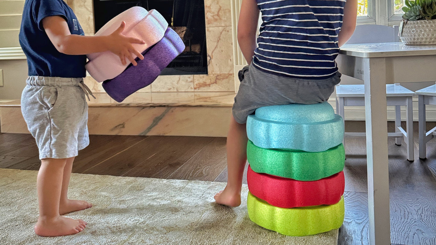 Colorful fun versatile stacking stones, stepping stones made out of lightweight Expended Polypropylene foam for kids for movement, open ended play, active learning, creativity, exercise, social development, motor development, cognitive development. can be combined with the balance board