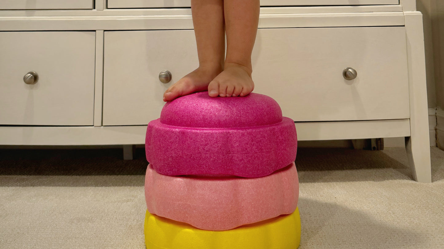 Colorful fun versatile stacking stones, stepping stones made out of lightweight Expended Polypropylene foam for kids for movement, open ended play, active learning, creativity, exercise, social development, motor development, cognitive development. can be combined with the balance board