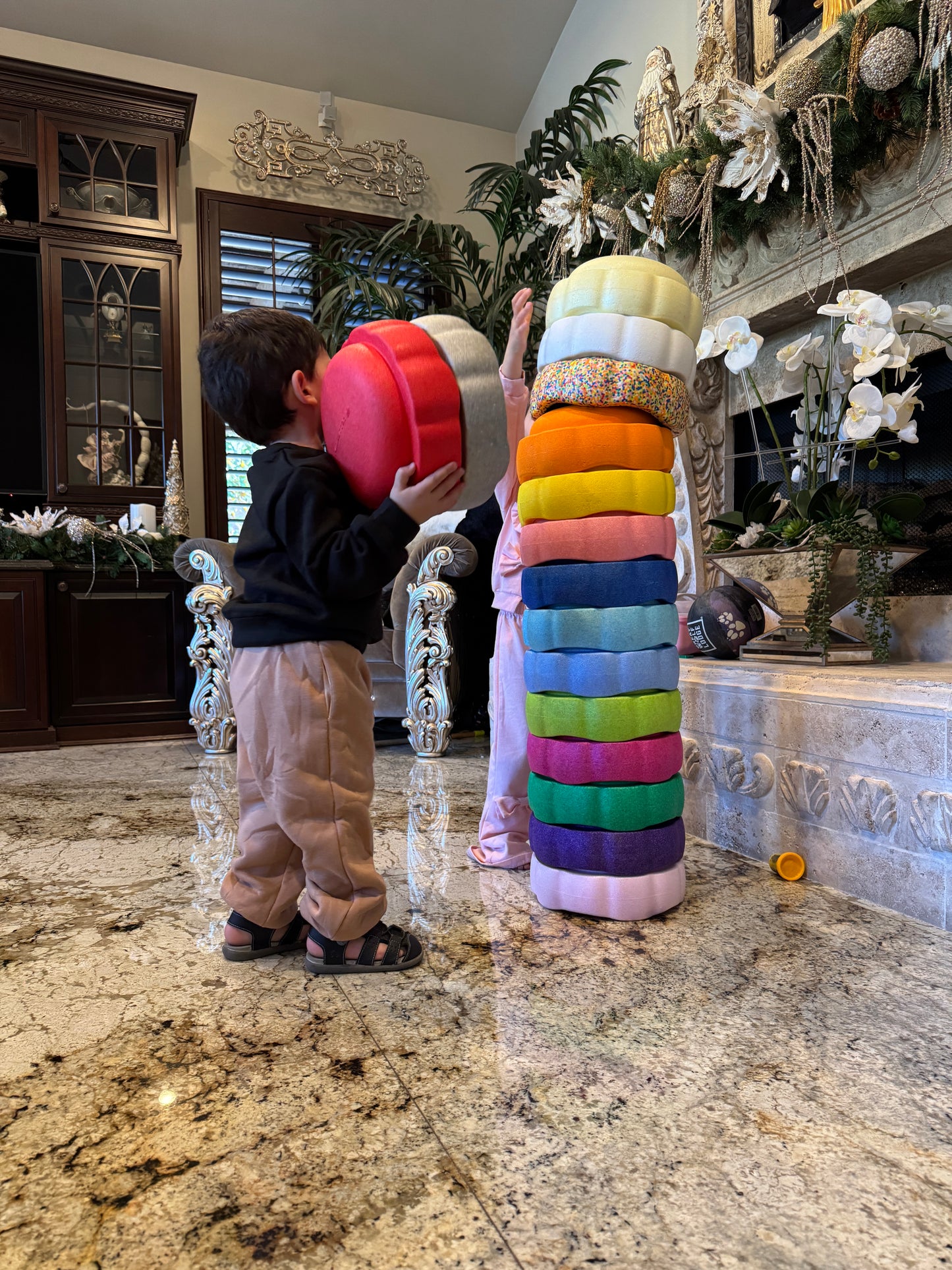 Colorful fun versatile stacking stones, stepping stones made out of lightweight Expended Polypropylene foam for kids for movement, open ended play, active learning, creativity, exercise, social development, motor development, cognitive development. can be combined with the balance board