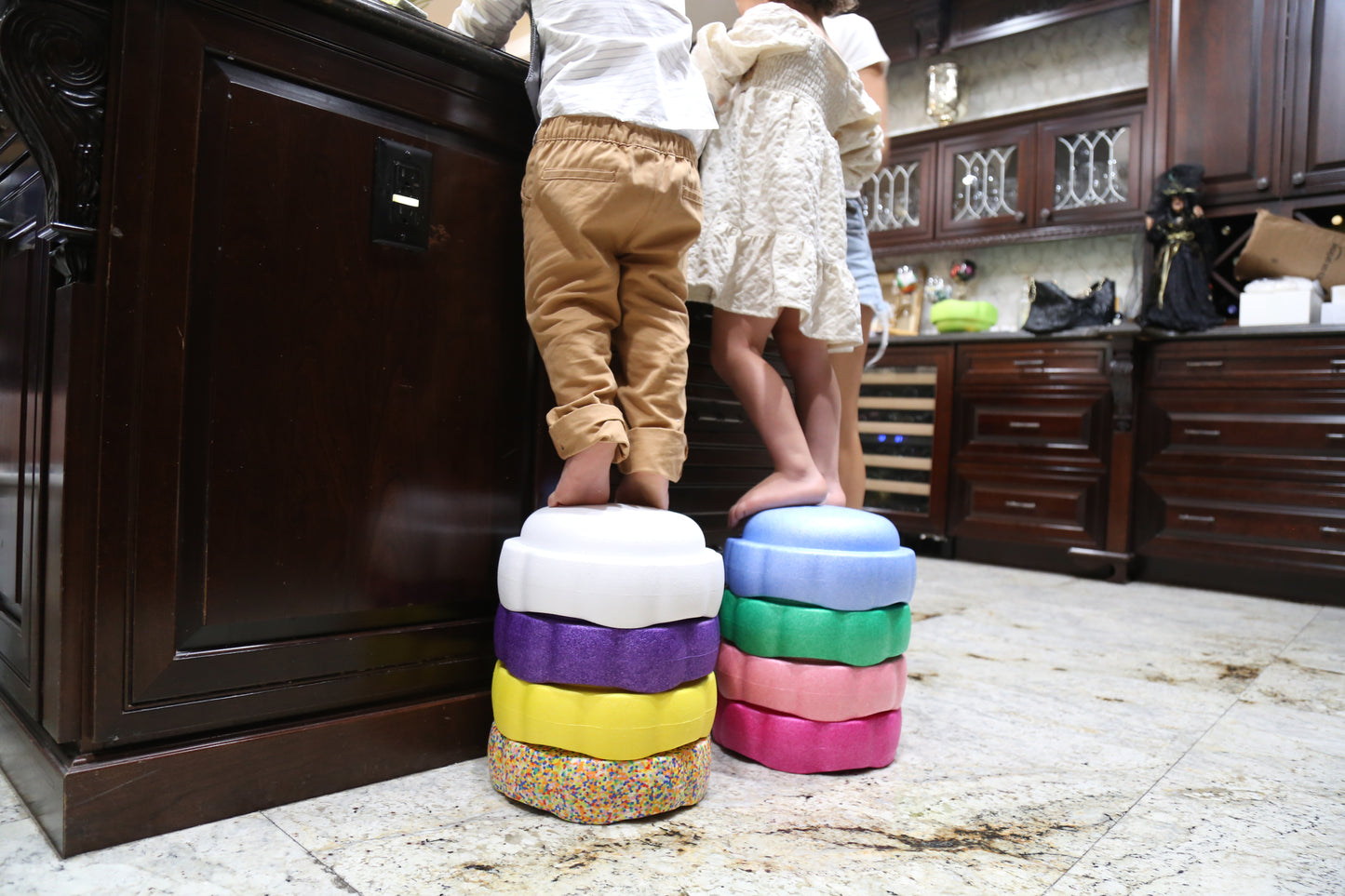 Colorful fun versatile stacking stones, stepping stones made out of lightweight Expended Polypropylene foam for kids for movement, open ended play, active learning, creativity, exercise, social development, motor development, cognitive development. can be combined with the balance board