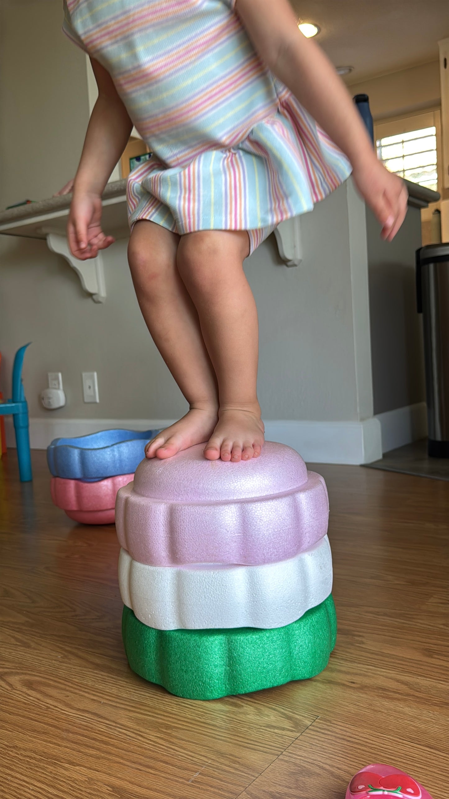 Colorful fun versatile stacking stones, stepping stones made out of lightweight Expended Polypropylene foam for kids for movement, open ended play, active learning, creativity, exercise, social development, motor development, cognitive development. can be combined with the balance board