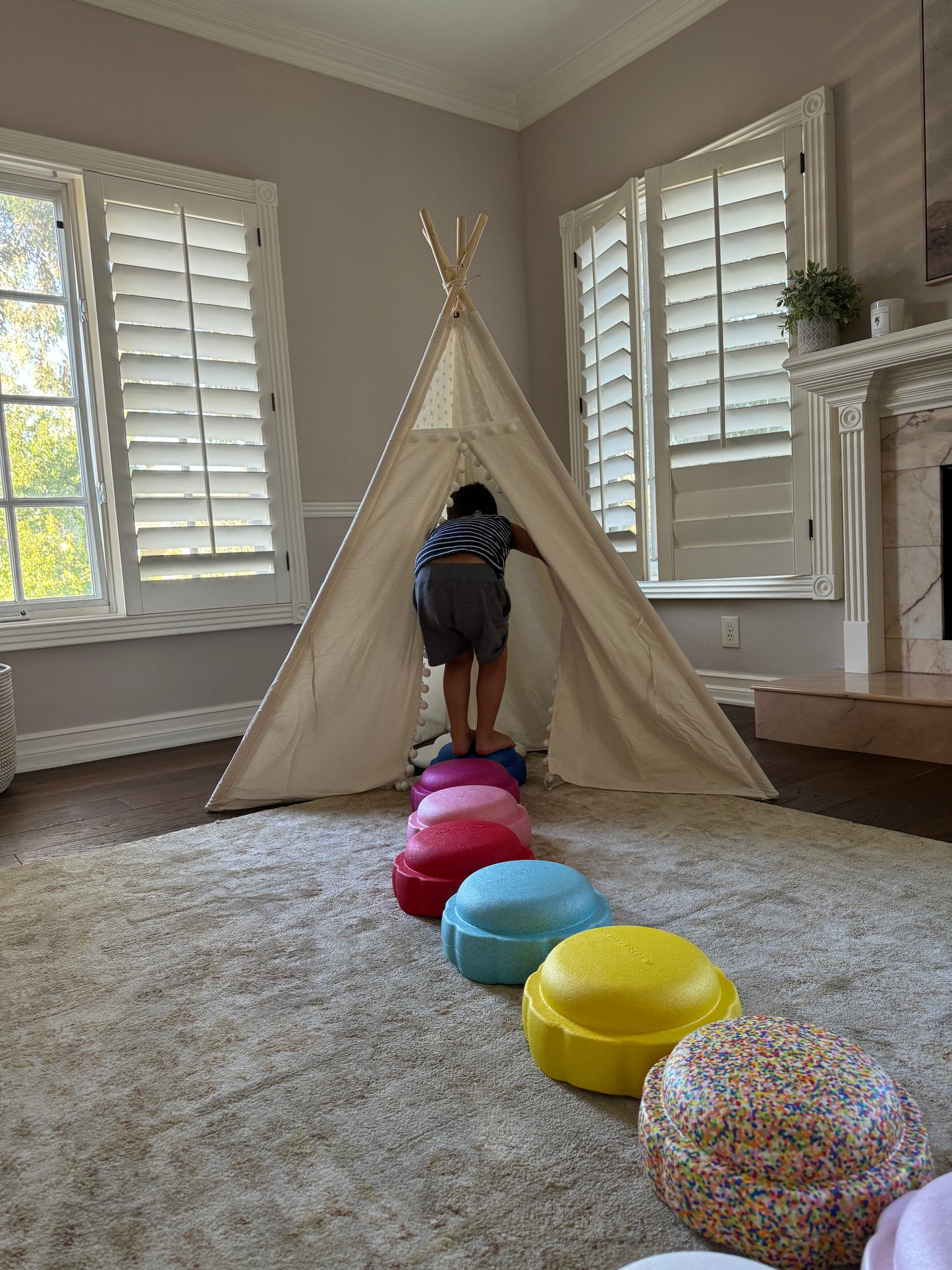 Colorful fun versatile stacking stones, stepping stones made out of lightweight Expended Polypropylene foam for kids for movement, open ended play, active learning, creativity, exercise, social development, motor development, cognitive development. can be combined with the balance board