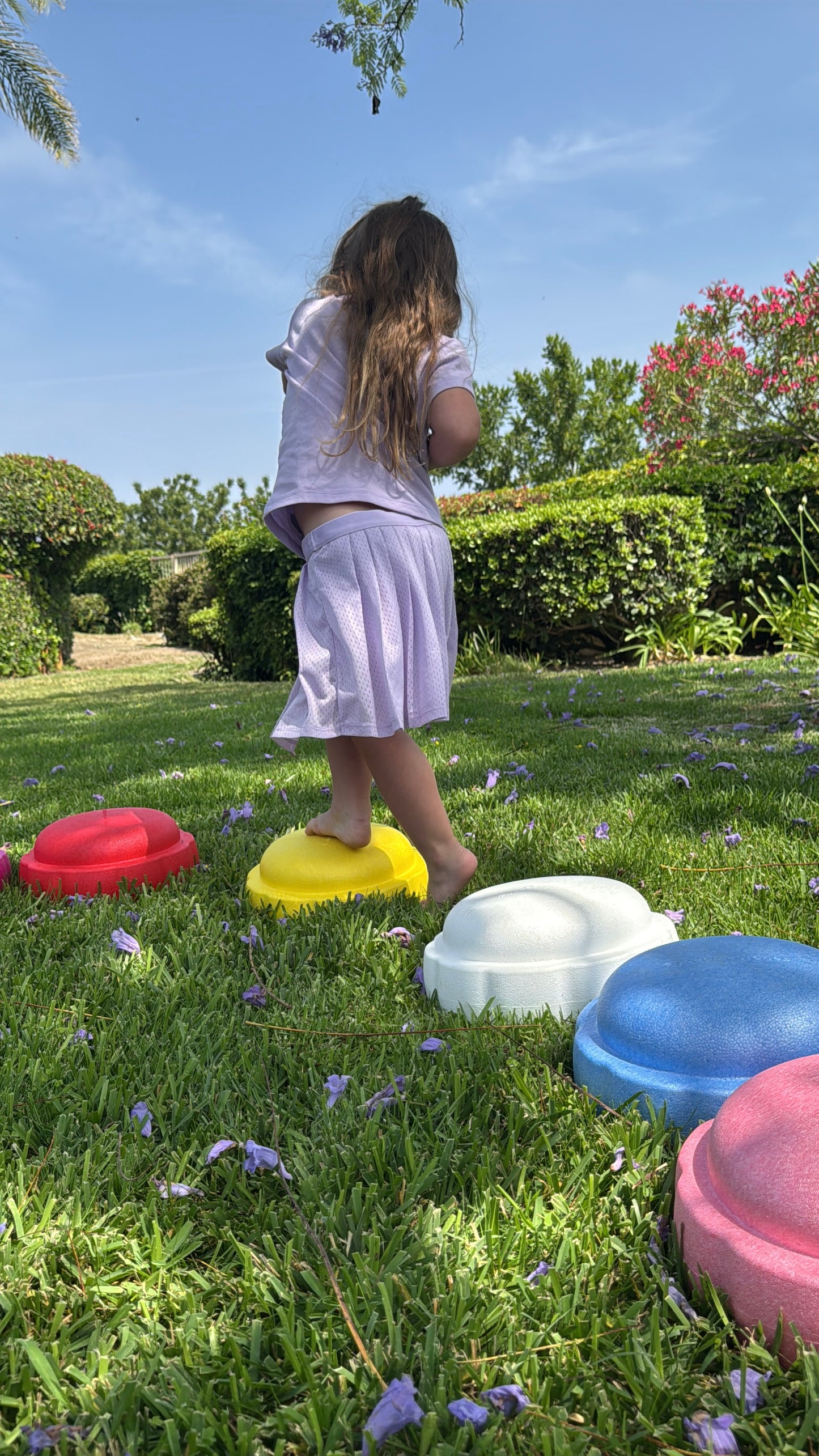 Colorful fun versatile stacking stones, stepping stones made out of lightweight Expended Polypropylene foam for kids for movement, open ended play, active learning, creativity, exercise, social development, motor development, cognitive development. can be combined with the balance board