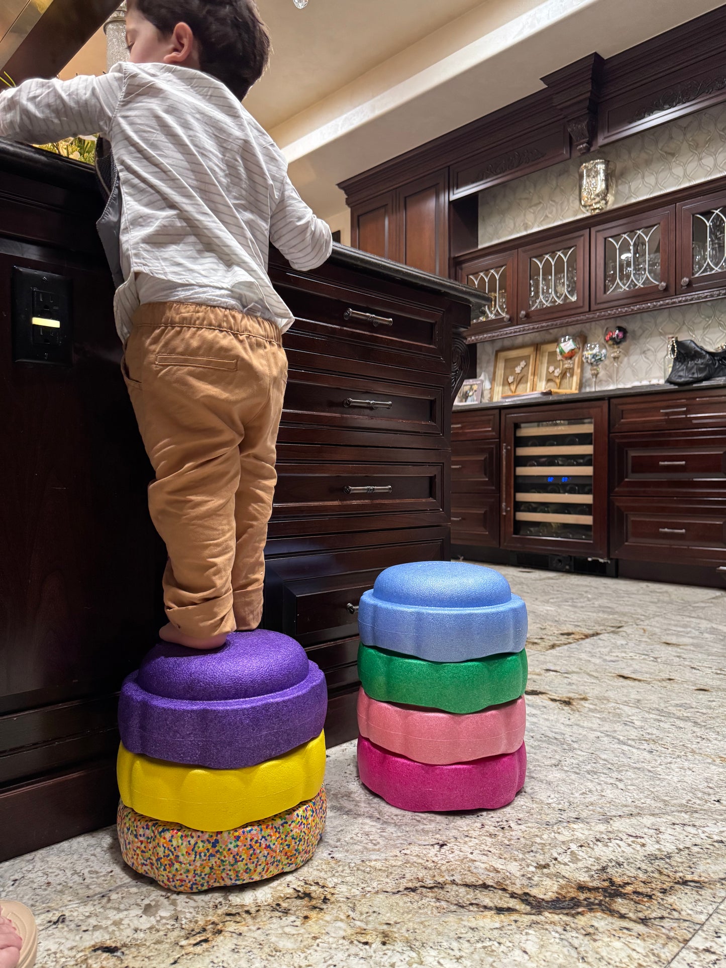 Colorful fun versatile stacking stones, stepping stones made out of lightweight Expended Polypropylene foam for kids for movement, open ended play, active learning, creativity, exercise, social development, motor development, cognitive development. can be combined with the balance board