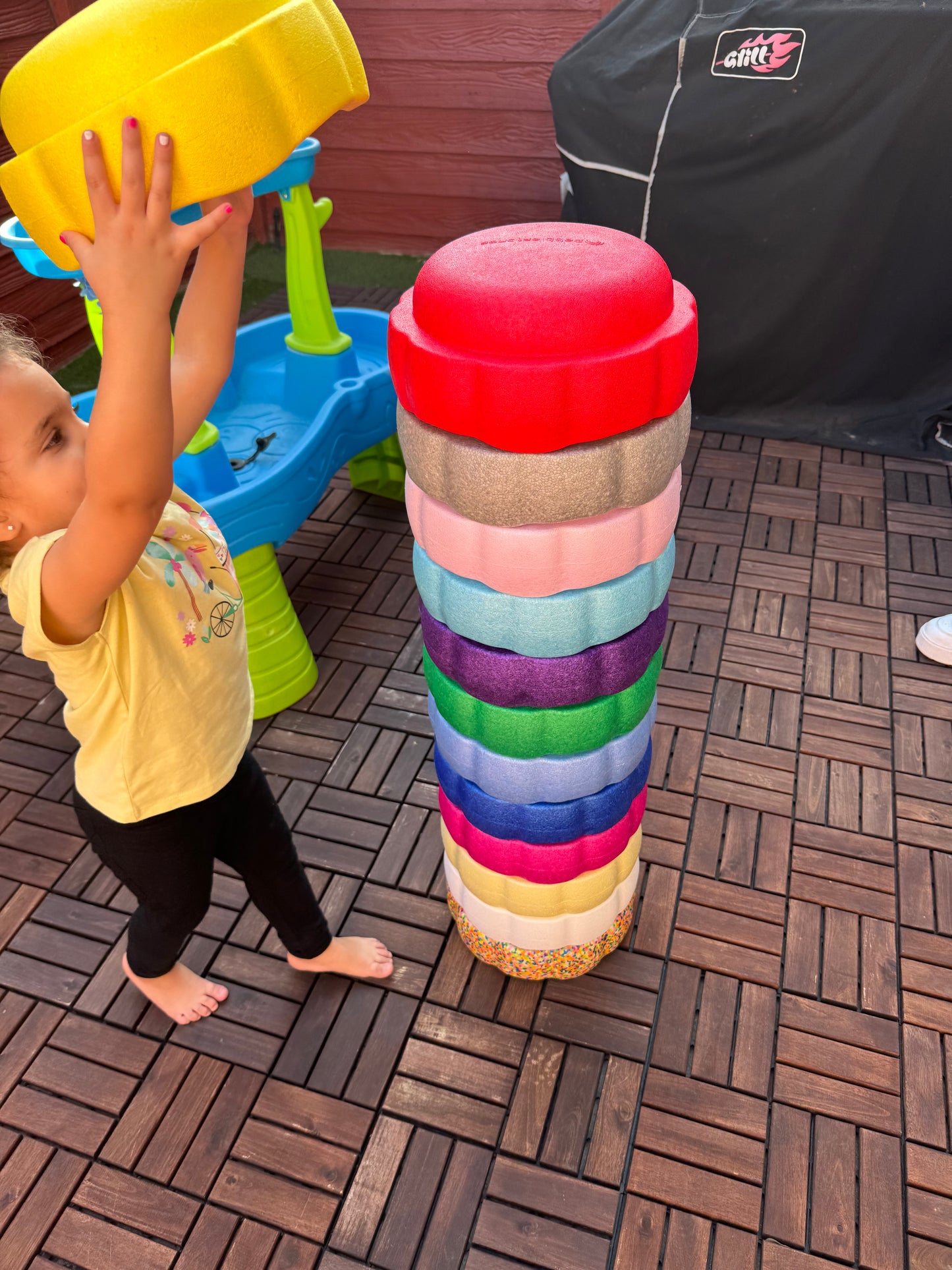 Colorful fun versatile stacking stones, stepping stones made out of lightweight Expended Polypropylene foam for kids for movement, open ended play, active learning, creativity, exercise, social development, motor development, cognitive development. can be combined with the balance board
