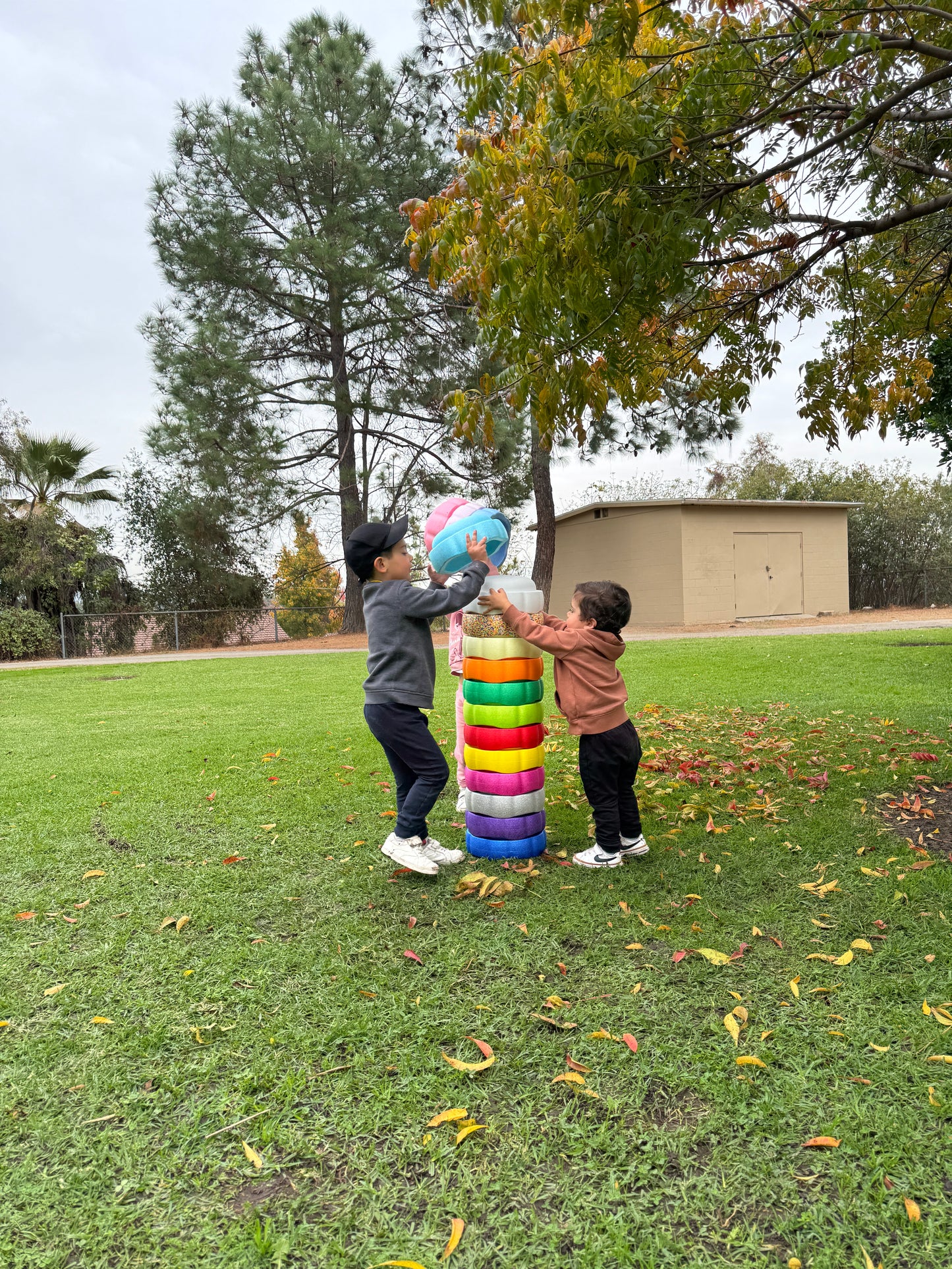 Colorful fun versatile stacking stones, stepping stones made out of lightweight Expended Polypropylene foam for kids for movement, open ended play, active learning, creativity, exercise, social development, motor development, cognitive development. can be combined with the balance board