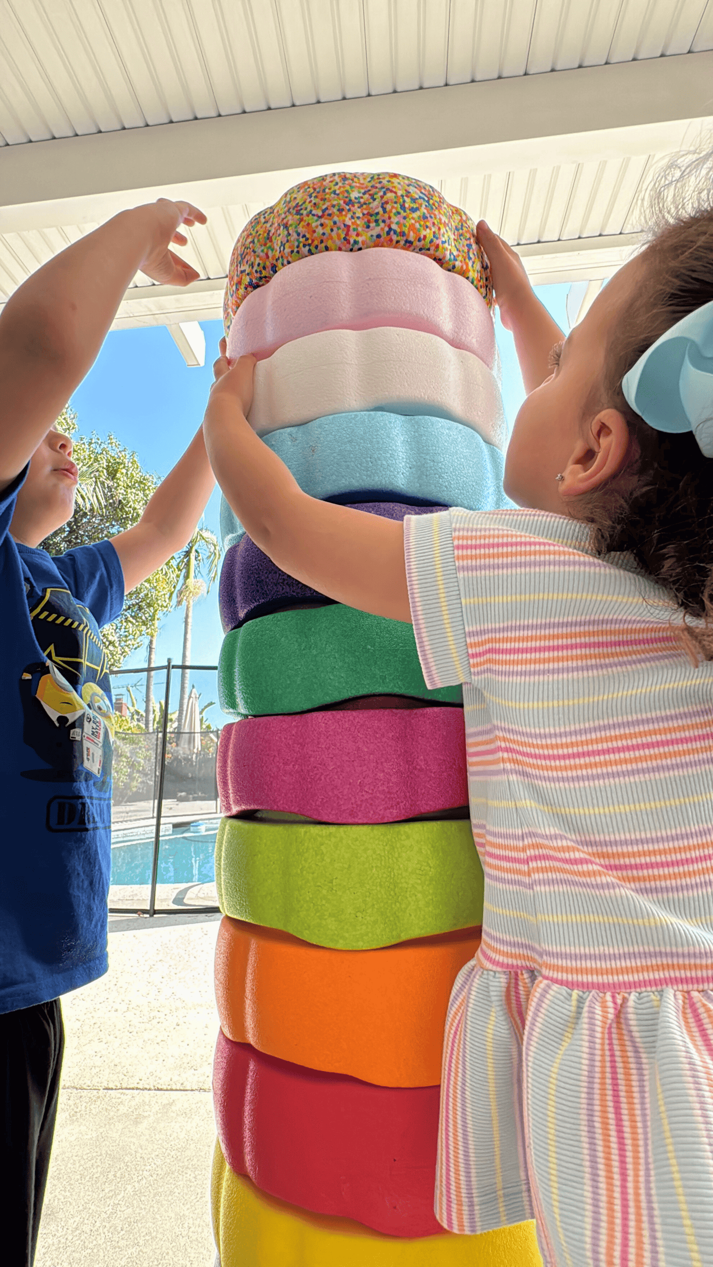 Colorful fun versatile stacking stones, stepping stones made out of lightweight Expended Polypropylene foam for kids for movement, open ended play, active learning, creativity, exercise, social development, motor development, cognitive development. can be combined with the balance board