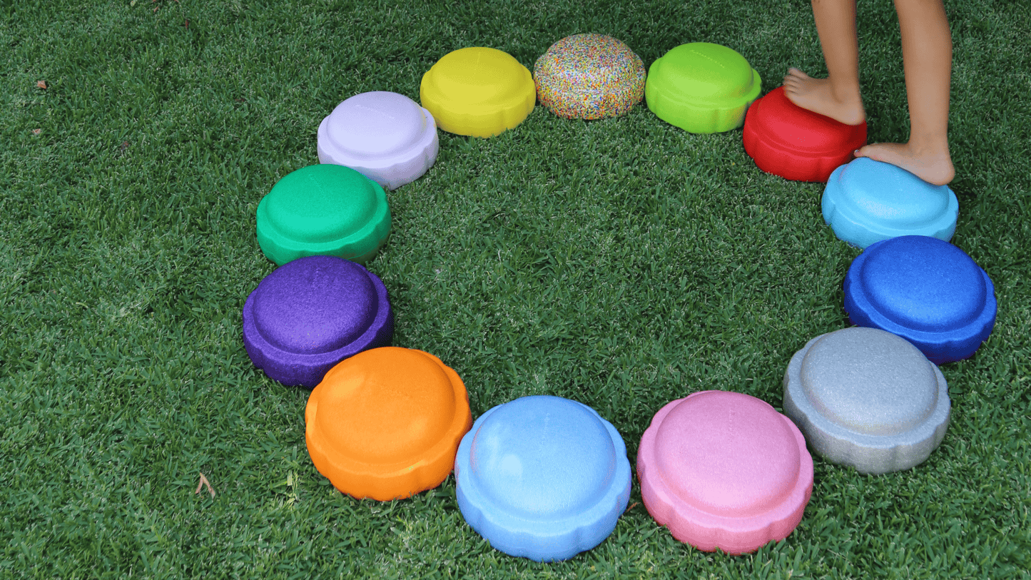 Colorful fun versatile stacking stones, stepping stones made out of lightweight Expended Polypropylene foam for kids for movement, open ended play, active learning, creativity, exercise, social development, motor development, cognitive development. can be combined with the balance board