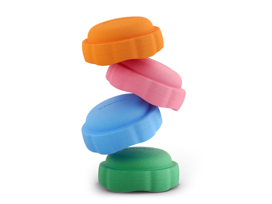 set of 4 orange, pink, pastel blue, jade colors versatile fun stacking stones, stepping stones made out of lightweight Expended Polypropylene foam for kids for movement, open ended play, active learning, creativity, exercise, social development, motor development, cognitive development. can be combined with the balance board.