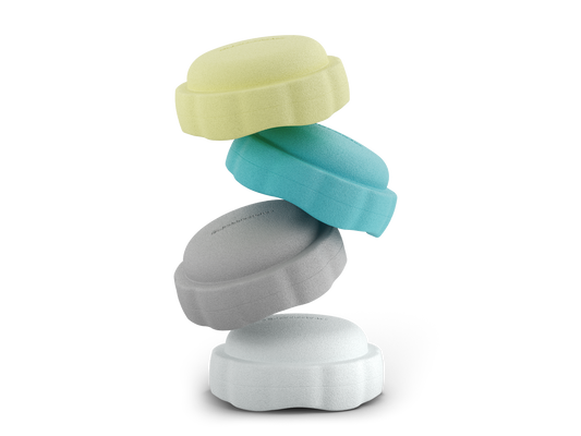 set of 4 pastel yellow, turquoise, grey, white colors versatile fun stacking stones, stepping stones made out of lightweight Expended Polypropylene foam for kids for movement, open ended play, active learning, creativity, exercise, social development, motor development, cognitive development. can be combined with the balance board.