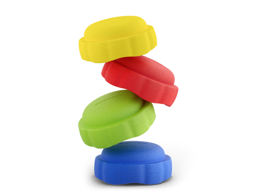 set of 4 yellow, red, green, dark blue colors versatile fun stacking stones, stepping stones made out of lightweight Expended Polypropylene foam for kids for movement, open ended play, active learning, creativity, exercise, social development, motor development, cognitive development. can be combined with the balance board.