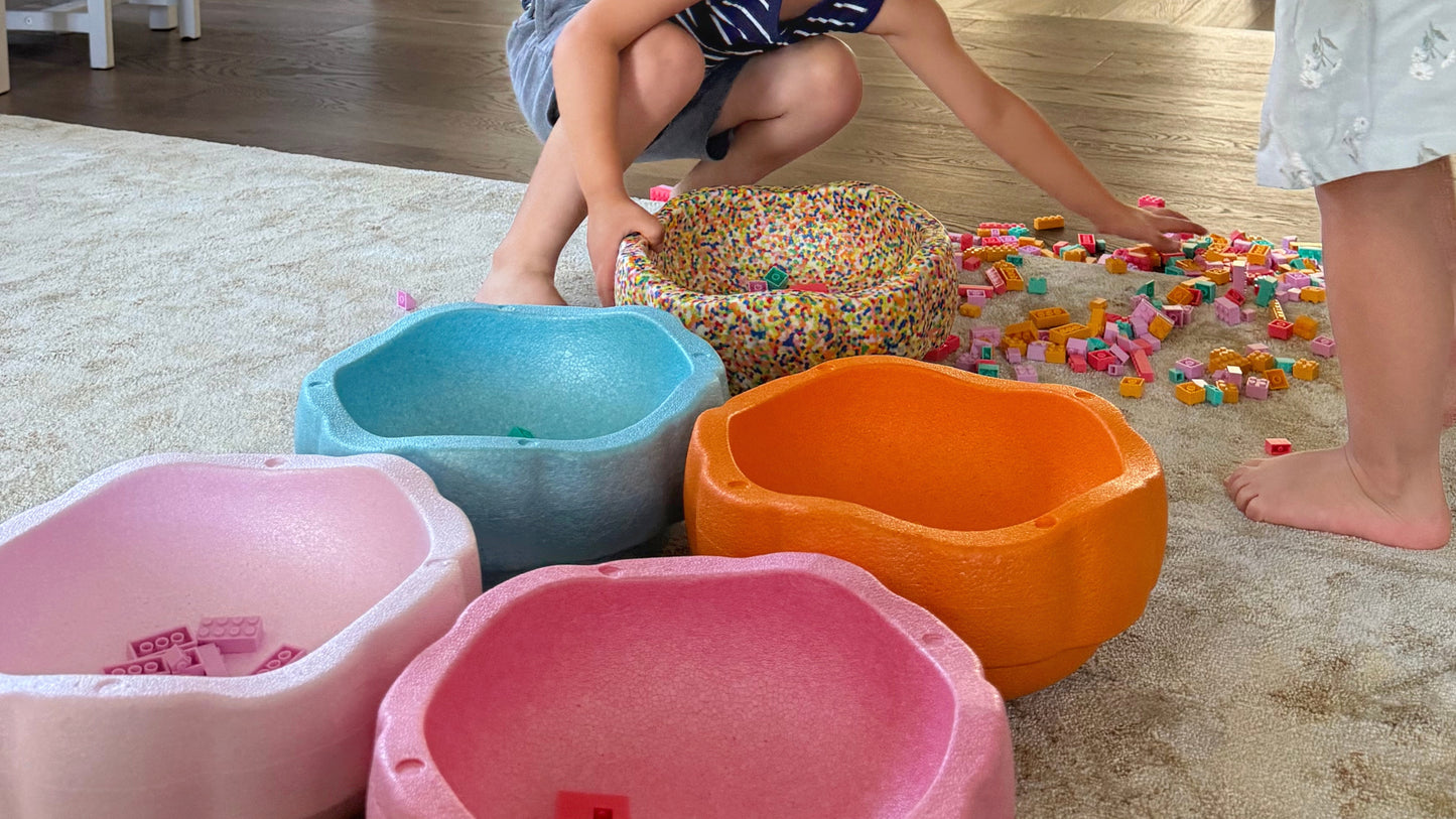 Colorful fun versatile stacking stones, stepping stones made out of lightweight Expended Polypropylene foam for kids for movement, open ended play, active learning, creativity, exercise, social development, motor development, cognitive development. can be combined with the balance board