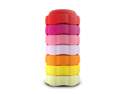 set of 7 red, dragon fruit, pink, light pink orange, yellow, pastel yellow colors versatile fun stacking stones, stepping stones made out of lightweight Expended Polypropylene foam for kids for movement, open ended play, active learning, creativity, exercise, social development, motor development, cognitive development. can be combined with the balance board.