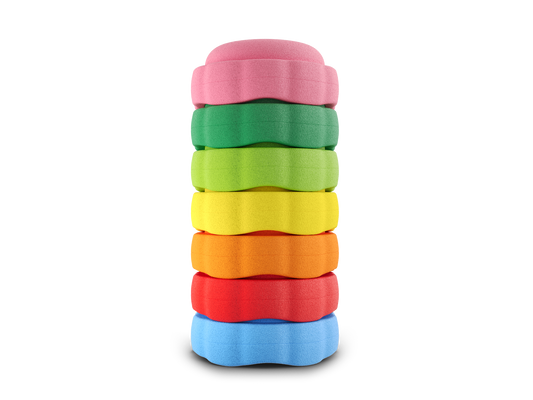 set of 7 pink, jade, green, yellow, orange, red, pastel blue colors versatile fun stacking stones, stepping stones made out of lightweight Expended Polypropylene foam for kids for movement, open ended play, active learning, creativity, exercise, social development, motor development, cognitive development. can be combined with the balance board.