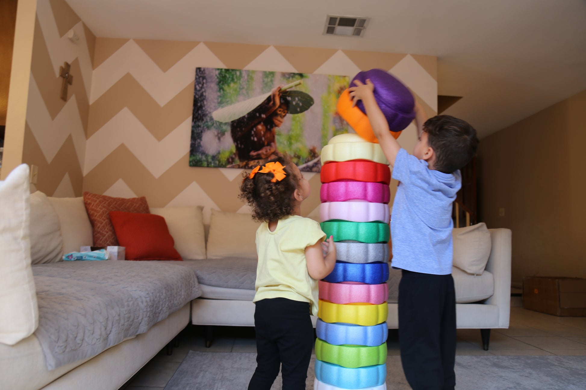 Colorful fun versatile stacking stones, stepping stones made out of lightweight Expended Polypropylene foam for kids for movement, open ended play, active learning, creativity, exercise, social development, motor development, cognitive development. can be combined with the balance board