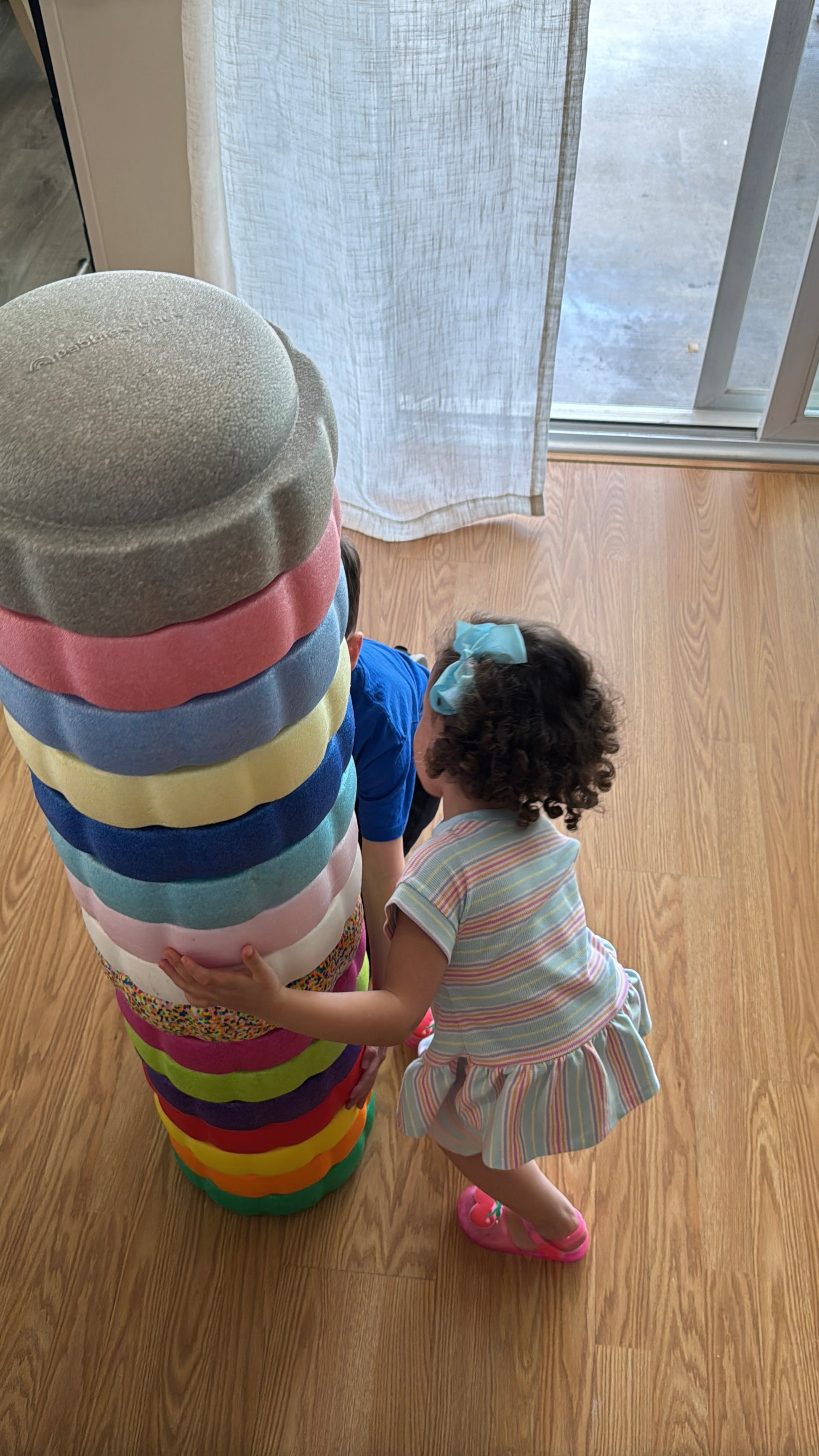 Colorful fun versatile stacking stones, stepping stones made out of lightweight Expended Polypropylene foam for kids for movement, open ended play, active learning, creativity, exercise, social development, motor development, cognitive development. can be combined with the balance board