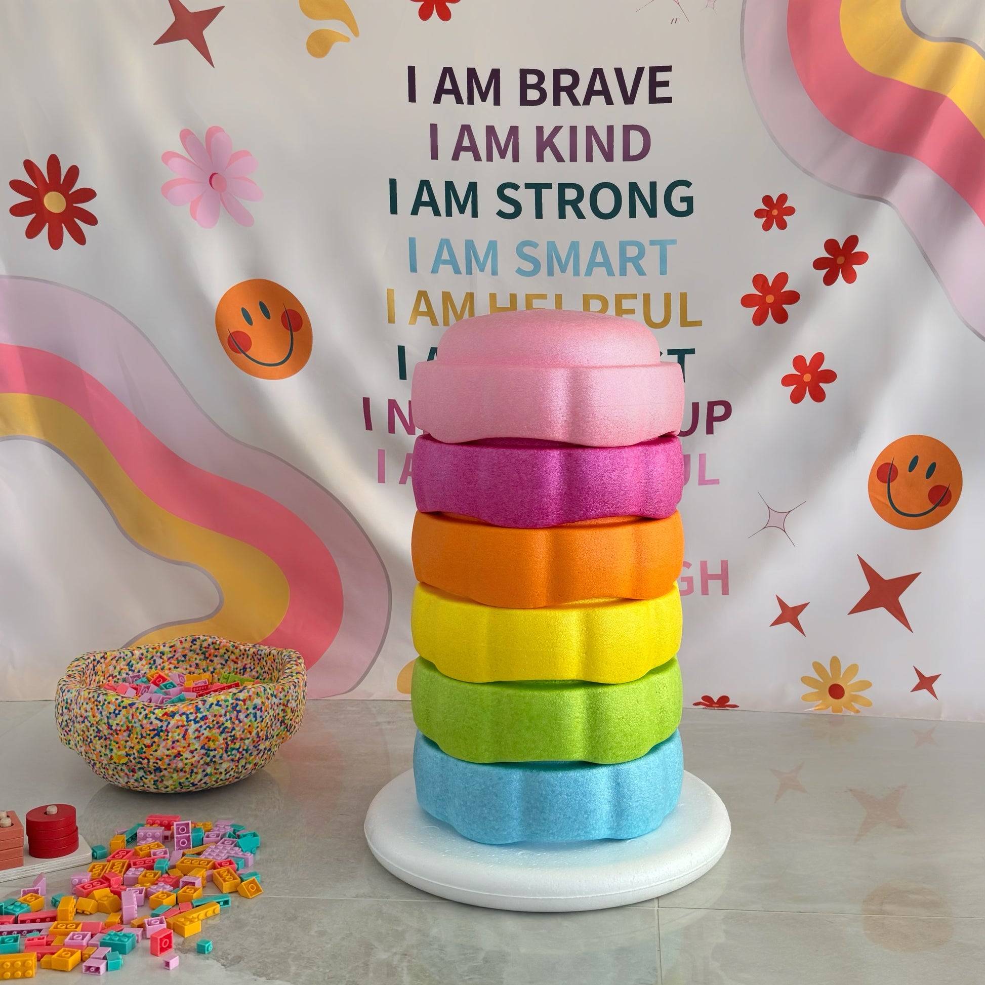 Colorful fun versatile stacking stones, stepping stones made out of lightweight Expended Polypropylene foam for kids for movement, open ended play, active learning, creativity, exercise, social development, motor development, cognitive development. can be combined with the balance board