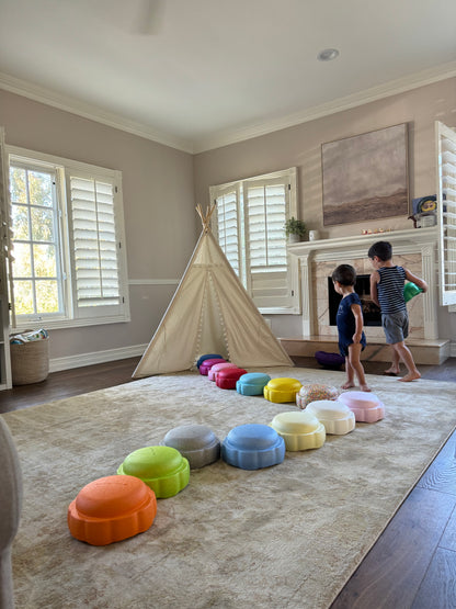 Colorful fun versatile stacking stones, stepping stones made out of lightweight Expended Polypropylene foam for kids for movement, open ended play, active learning, creativity, exercise, social development, motor development, cognitive development. can be combined with the balance board