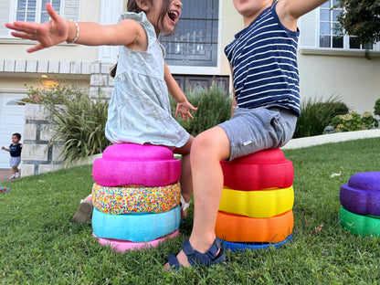 Colorful fun versatile stacking stones, stepping stones made out of lightweight Expended Polypropylene foam for kids for movement, open ended play, active learning, creativity, exercise, social development, motor development, cognitive development. can be combined with the balance board