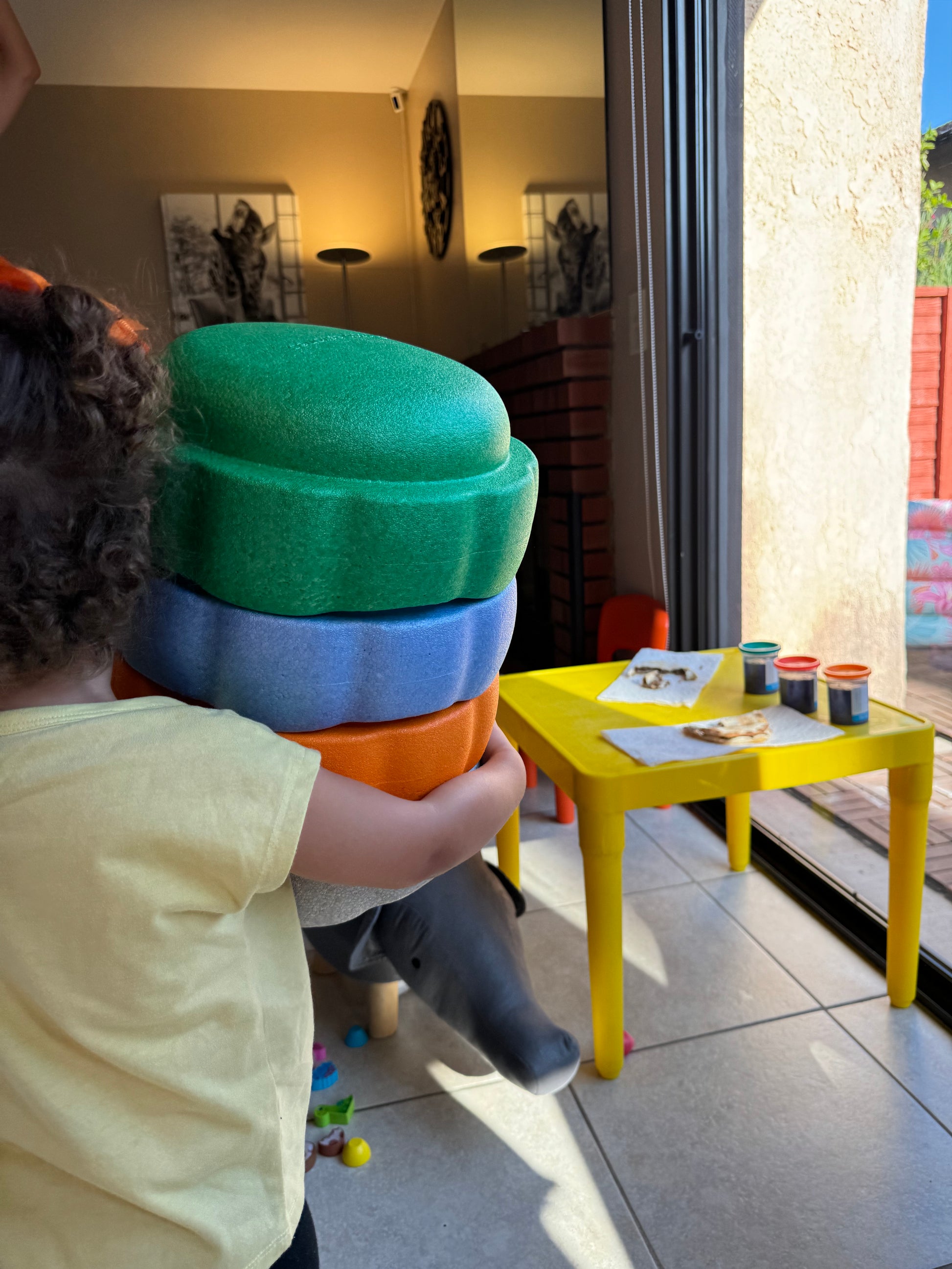 Colorful fun versatile stacking stones, stepping stones made out of lightweight Expended Polypropylene foam for kids for movement, open ended play, active learning, creativity, exercise, social development, motor development, cognitive development. can be combined with the balance board