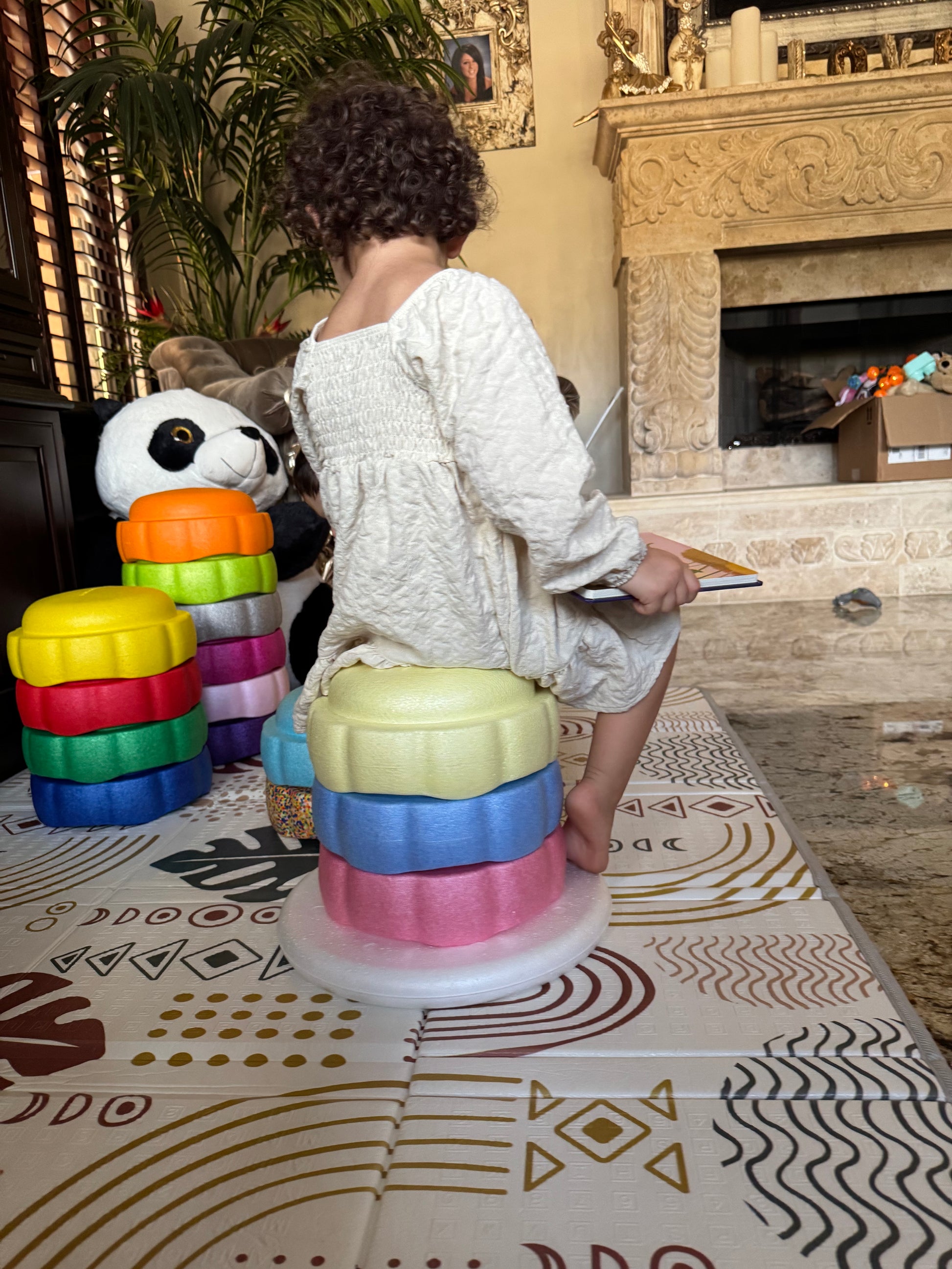 Colorful fun versatile stacking stones, stepping stones made out of lightweight Expended Polypropylene foam for kids for movement, open ended play, active learning, creativity, exercise, social development, motor development, cognitive development. can be combined with the balance board