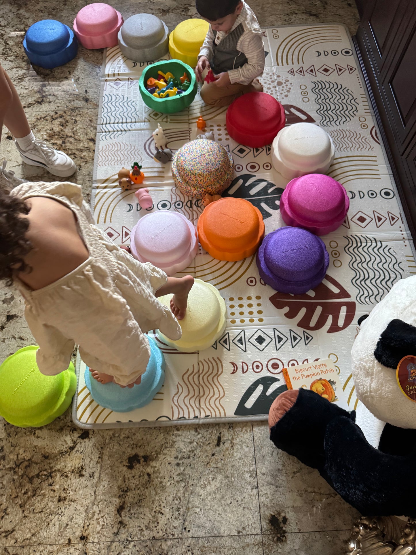 Colorful fun versatile stacking stones, stepping stones made out of lightweight Expended Polypropylene foam for kids for movement, open ended play, active learning, creativity, exercise, social development, motor development, cognitive development. can be combined with the balance board