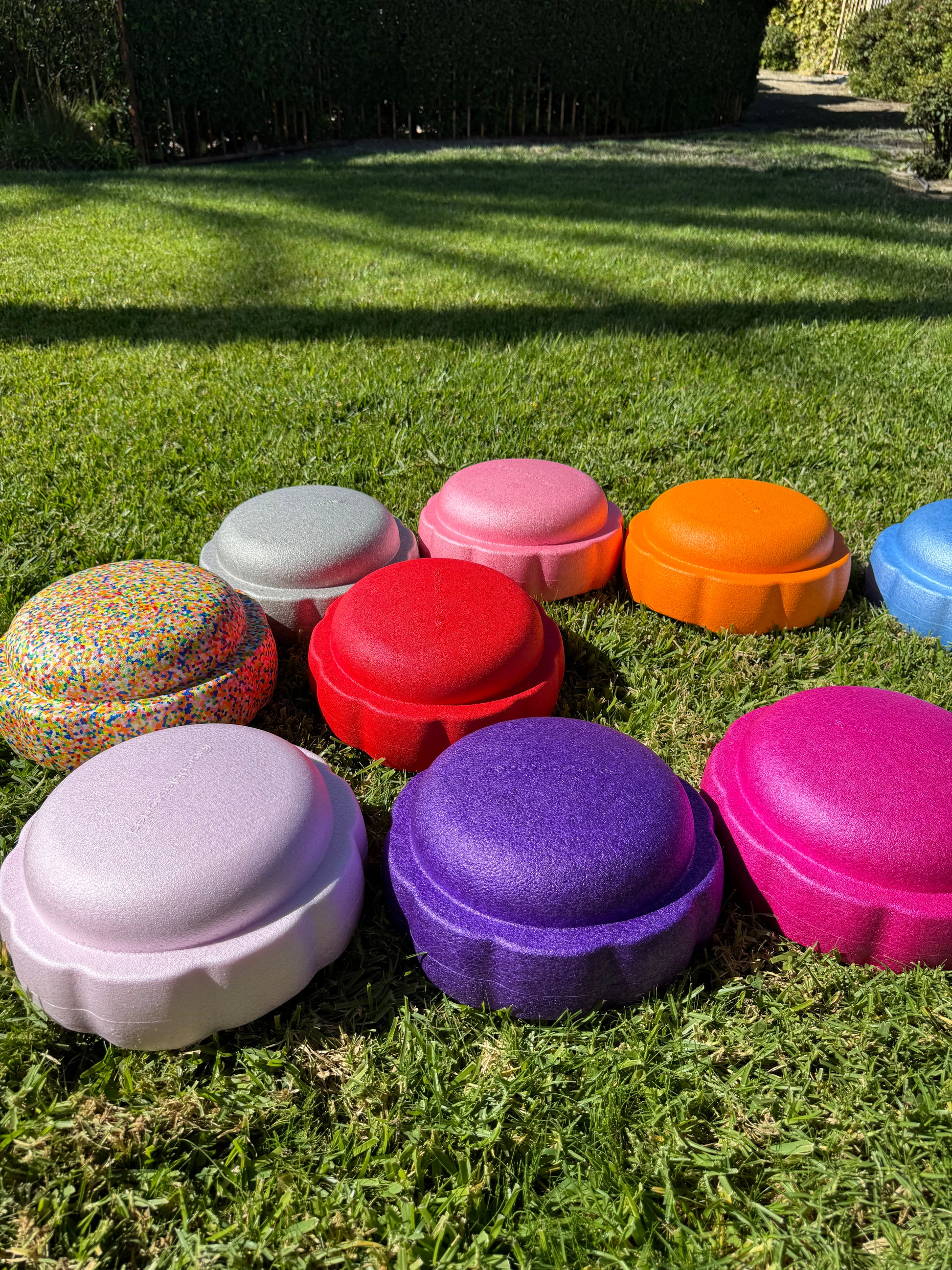Colorful fun versatile stacking stones, stepping stones made out of lightweight Expended Polypropylene foam for kids for movement, open ended play, active learning, creativity, exercise, social development, motor development, cognitive development. can be combined with the balance board