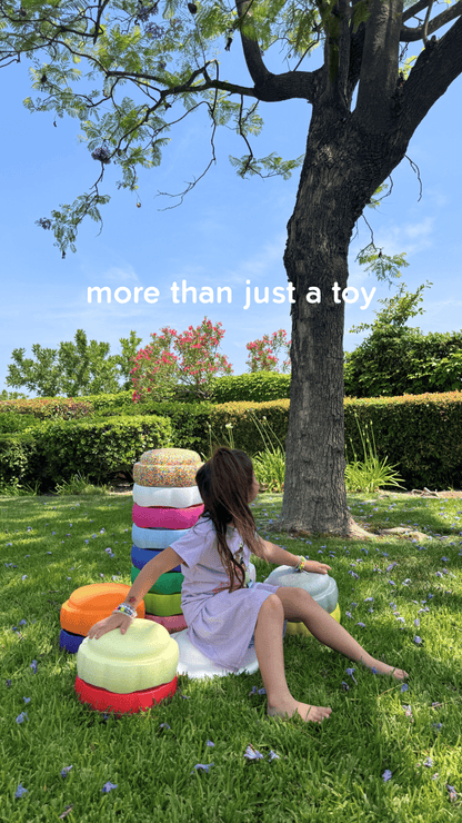 Colorful fun versatile stacking stones, stepping stones made out of lightweight Expended Polypropylene foam for kids for movement, open ended play, active learning, creativity, exercise, social development, motor development, cognitive development. can be combined with the balance board