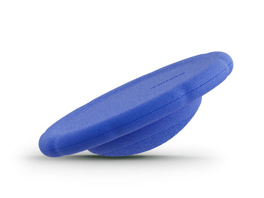 dark blue balance board for workout, exercise, movement, and active play for kids. Used for yoga and physical therapy. Raised edge for extra support. Can be combined with the stacking stones. made of 100% Expended Polypropylene.