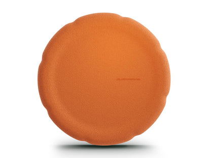 orange balance board for workout, exercise, movement, and active play for kids. Used for yoga and physical therapy. Raised edge for extra support. Can be combined with the stacking stones. made of 100% Expended Polypropylene.