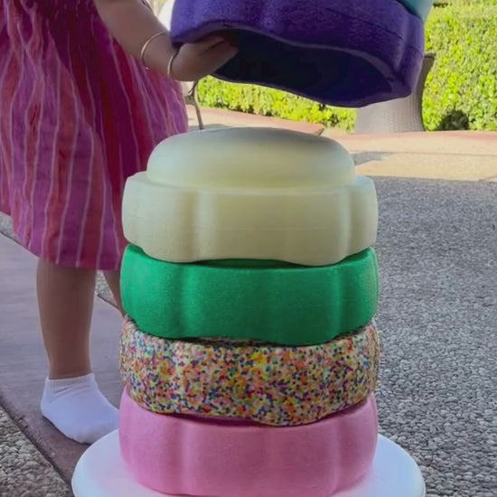 Colorful fun versatile stacking stones, stepping stones made out of lightweight Expended Polypropylene foam for kids for movement, open ended play, active learning, creativity, exercise, social development, motor development, cognitive development. can be combined with the balance board