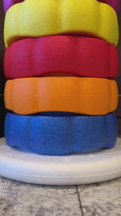 Colorful fun versatile stacking stones, stepping stones made out of lightweight Expended Polypropylene foam for kids for movement, open ended play, active learning, creativity, exercise, social development, motor development, cognitive development. can be combined with the balance board