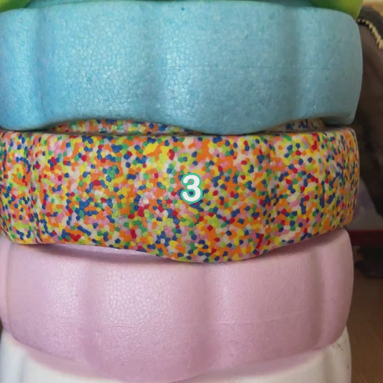 Colorful fun versatile stacking stones, stepping stones made out of lightweight Expended Polypropylene foam for kids for movement, open ended play, active learning, creativity, exercise, social development, motor development, cognitive development. can be combined with the balance board