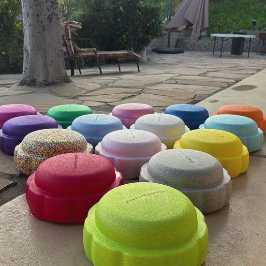 Colorful fun versatile stacking stones, stepping stones made out of lightweight Expended Polypropylene foam for kids for movement, open ended play, active learning, creativity, exercise, social development, motor development, cognitive development. can be combined with the balance board