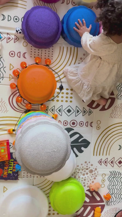 Colorful fun versatile stacking stones, stepping stones made out of lightweight Expended Polypropylene foam for kids for movement, open ended play, active learning, creativity, exercise, social development, motor development, cognitive development. can be combined with the balance board